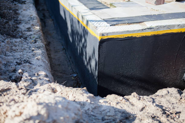 Professional Waterproofing technician working in Fortville, IN